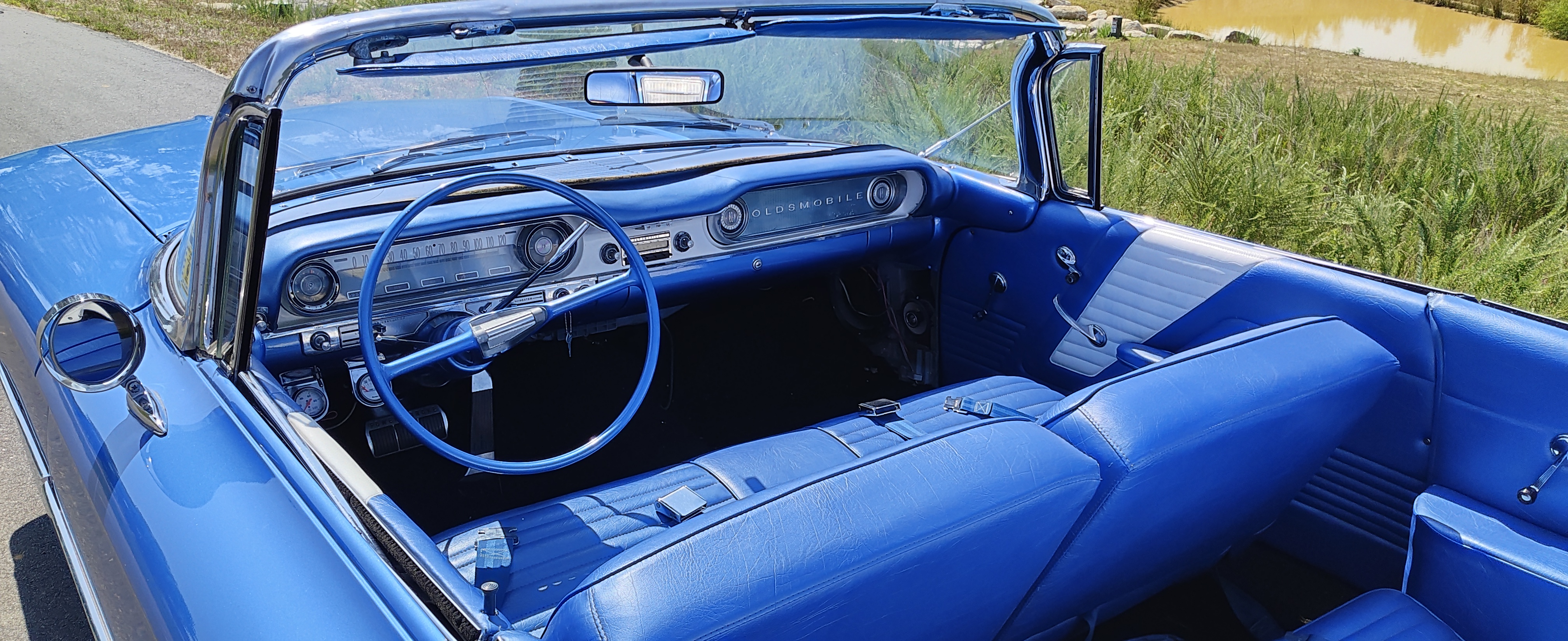 Blue and white Oldsmobile interior